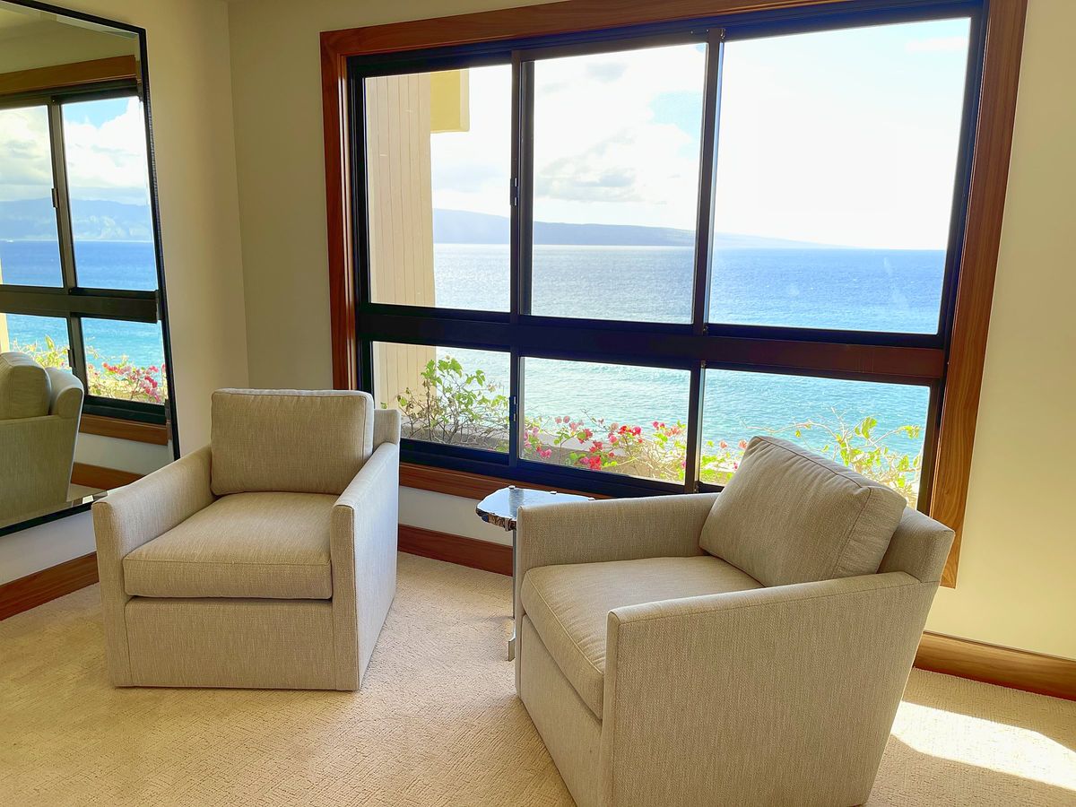 Ocean-view sitting room in a renovated resort condo