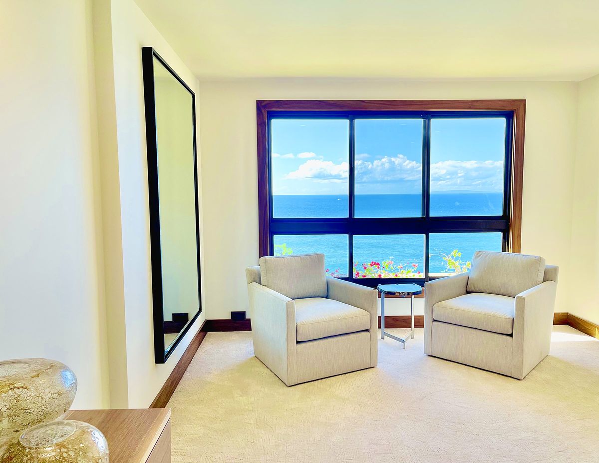 Renovated oceanfront resort condo sitting room